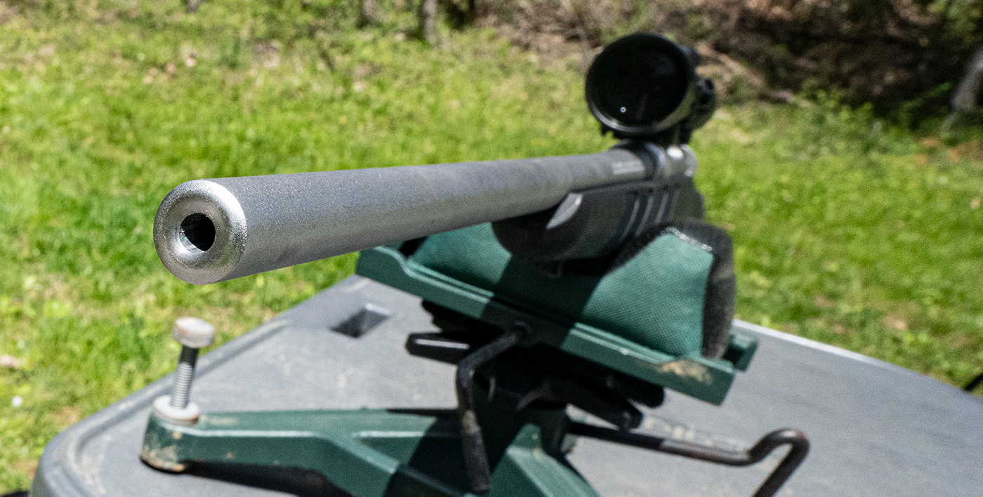 muzzle of a 22-250 rifle where bullets exit toward target