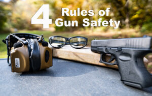 Hearing and eye protection with a pistol to demonstrate the 4 rules of gun safety