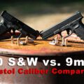 40 S&W and 9mm pistols on a barrel top