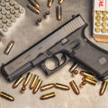 photo of a glock 17 pistol with 9mm ammo