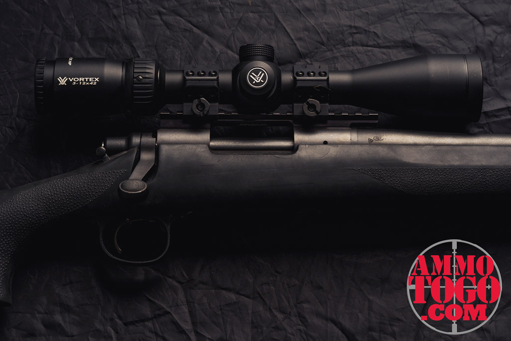 photo of remington rifle with a vortex scope