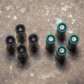 photo of sabot slugs next to lead slugs on a concrete floor
