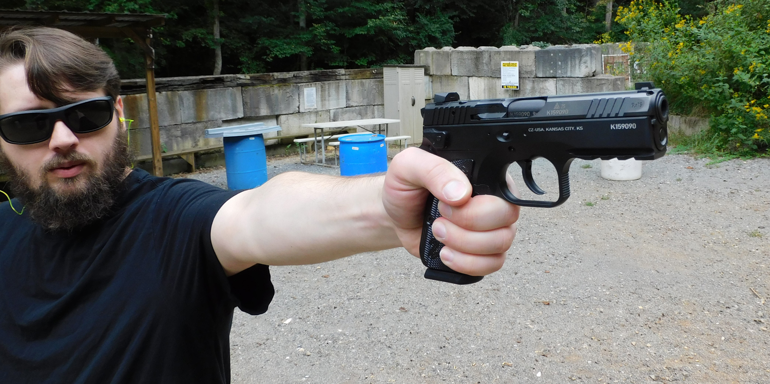 Bucky, the author, firing the CZ Shadow 2 Carry pistol at the range