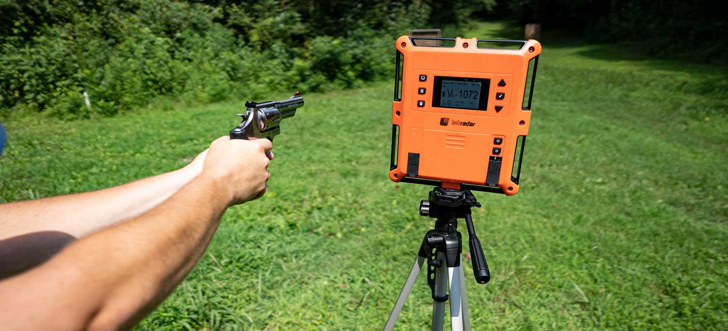 Measuring muzzle velocity of each caliber with a chronograph at a shooting range