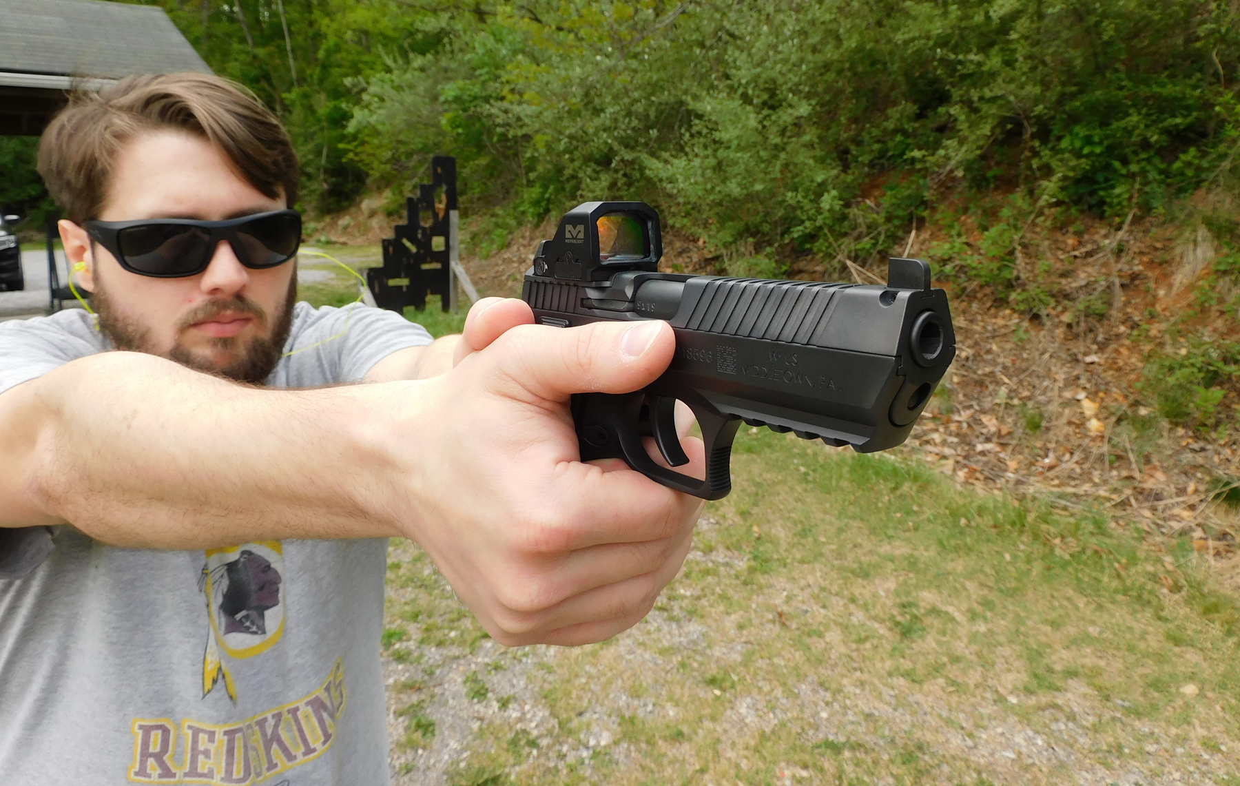 A close up of the author firing the IWI Jericho pistol