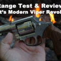Colt Viper revolver in front of a fire
