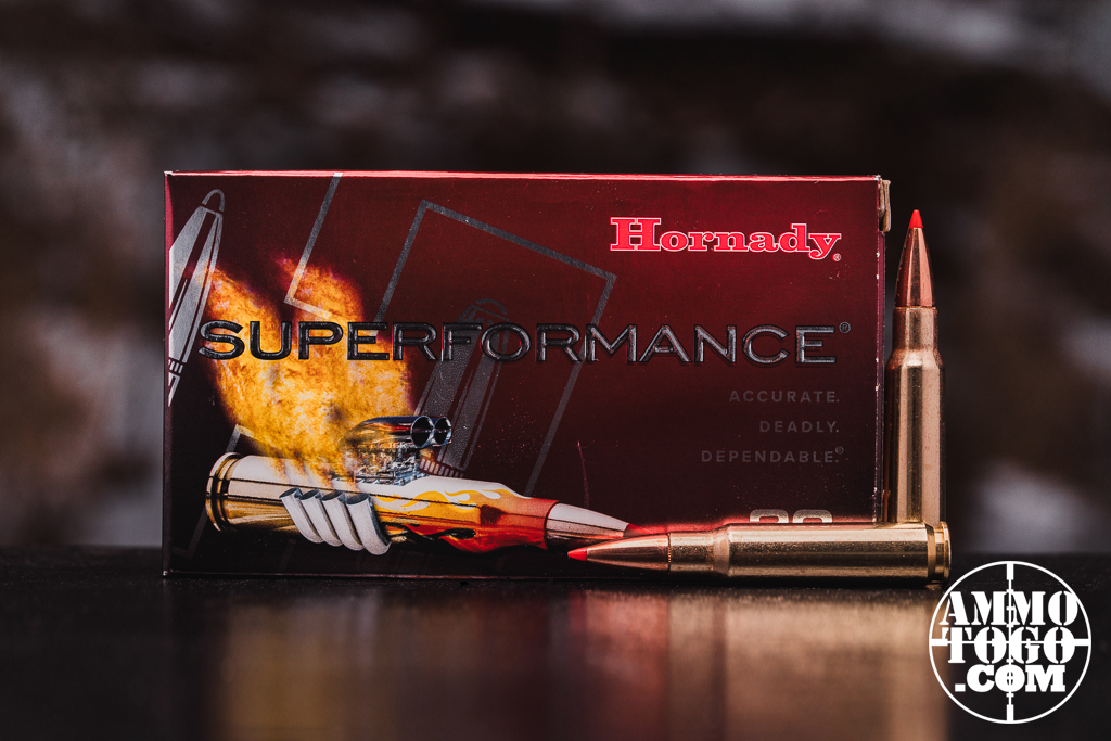 Hornady Superformance 308 ammo displayed at a shooting range