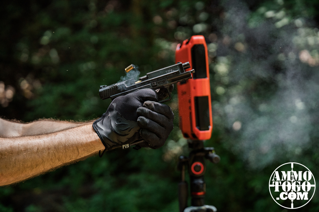 Recoil demonstration The author demonstrating recoil while at the shooting range with a pistol