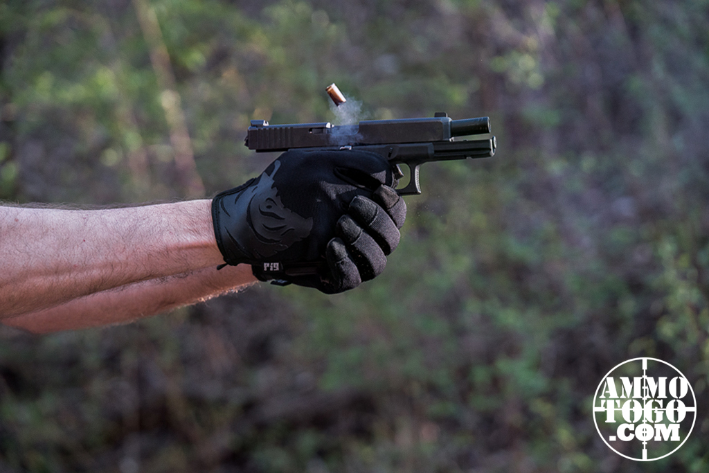 shooting low recoil 9mm ammo The author shooting low recoil 9mm ammo at an outdoor shooting range