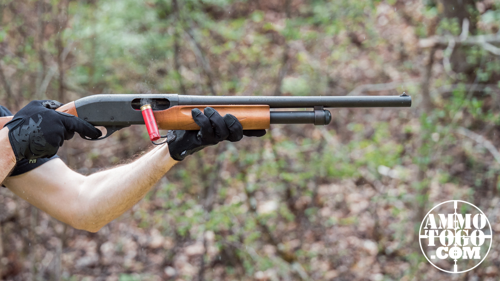 Firing 12 gauge shotgun The author firing a 12 gauge shotgun at a shooting range
