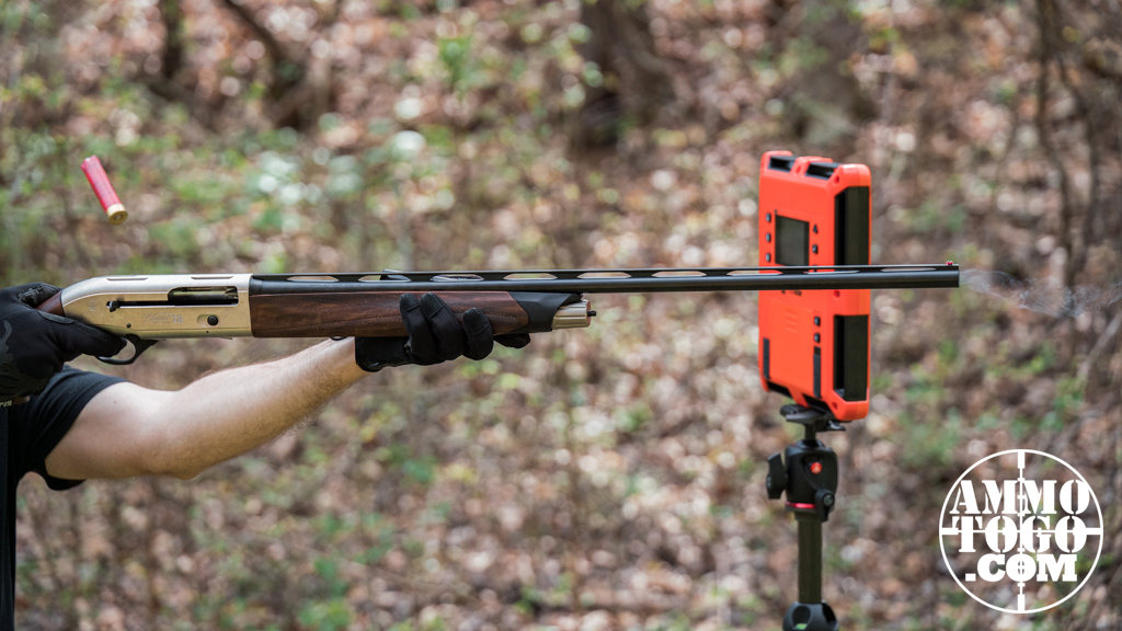 Firing Beretta 28 gauge shotgun The author firing a Beretta 28 gauge shotgun at an outdoor shooting range