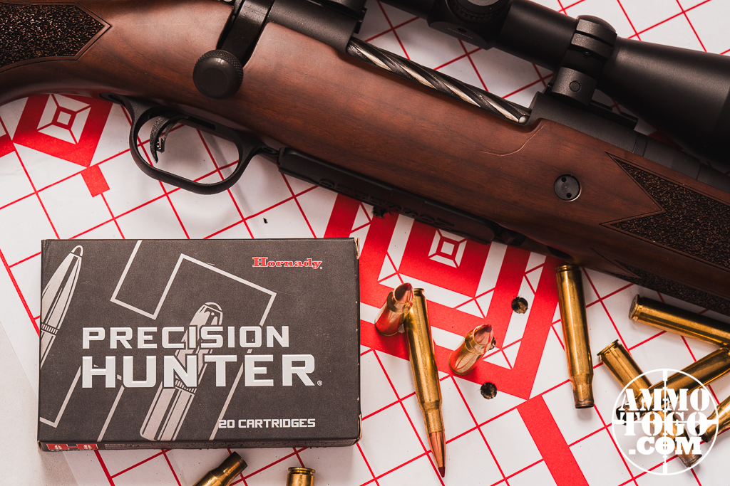 Rifle and ammunition on top of a paper target
