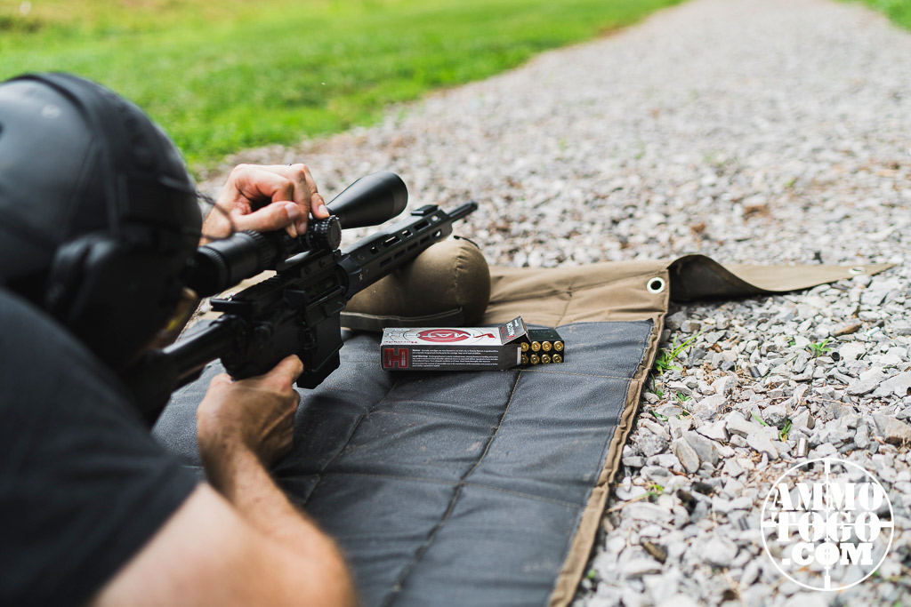 Firing a 6.5 Grendel rifle while prone at the range