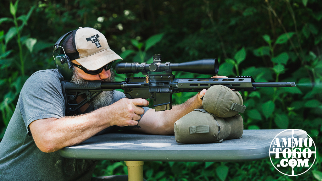 Firing a 6.5 grendel rifle from a rest at a shooting range