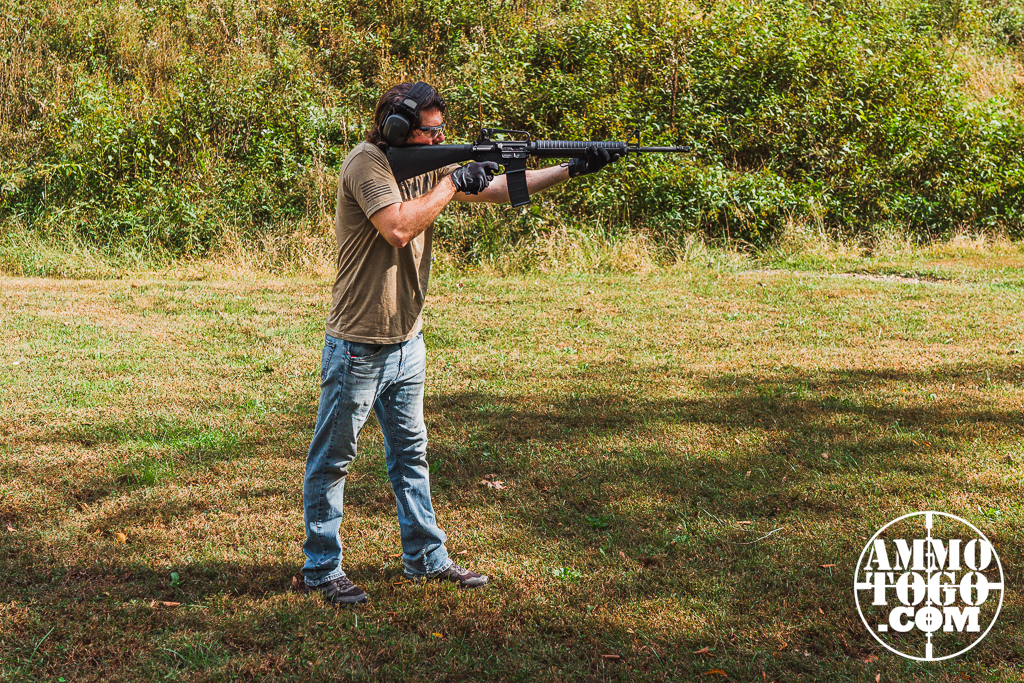 Standing position demonstrated The author firing an AR-15 at a shooting range from the standing position