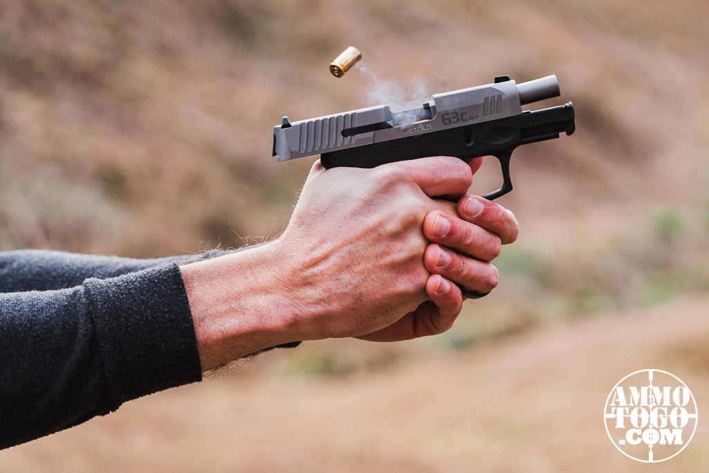 The author shooting a Taurus G3C pistol at the range