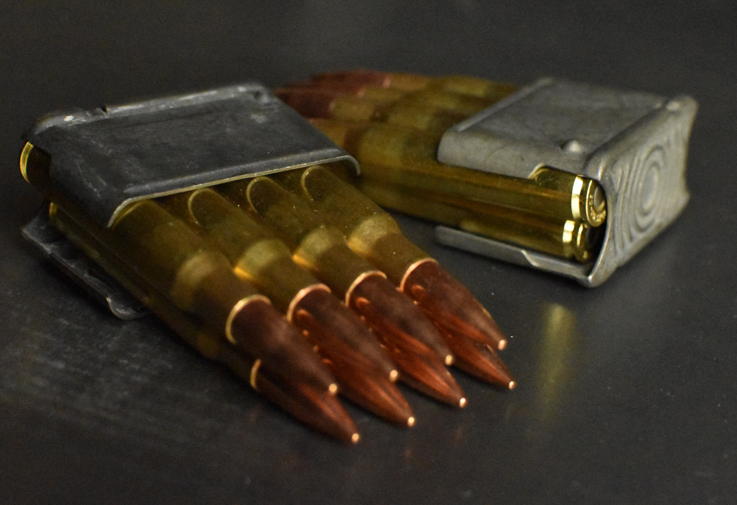 Two en bloc clips loaded with 30-06 ammo commonly used by an M1 Garand rifle