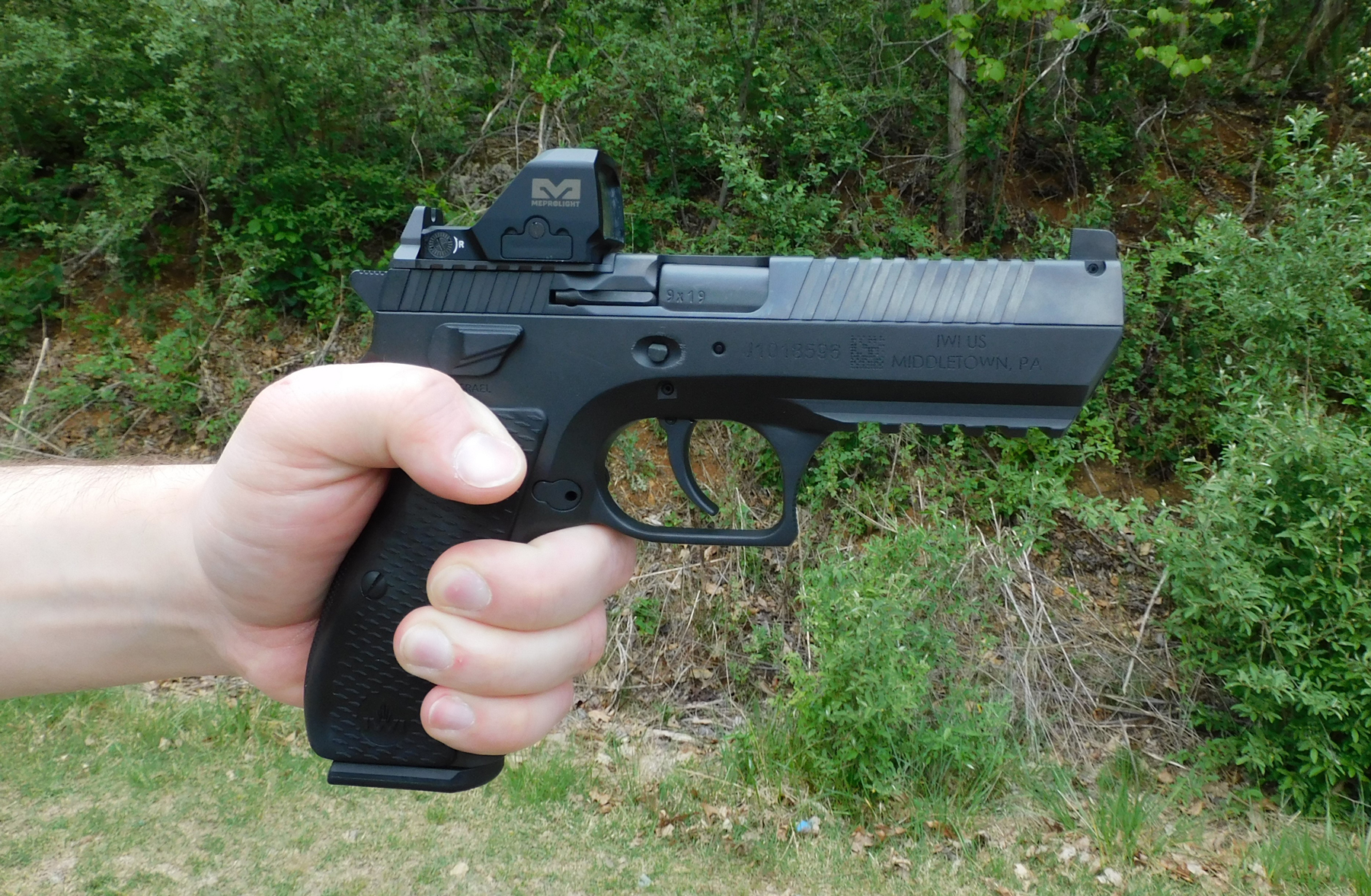 Trigger-on-the-IWI-Jericho-941 A close up of the trigger on the IWI Jericho handgun.