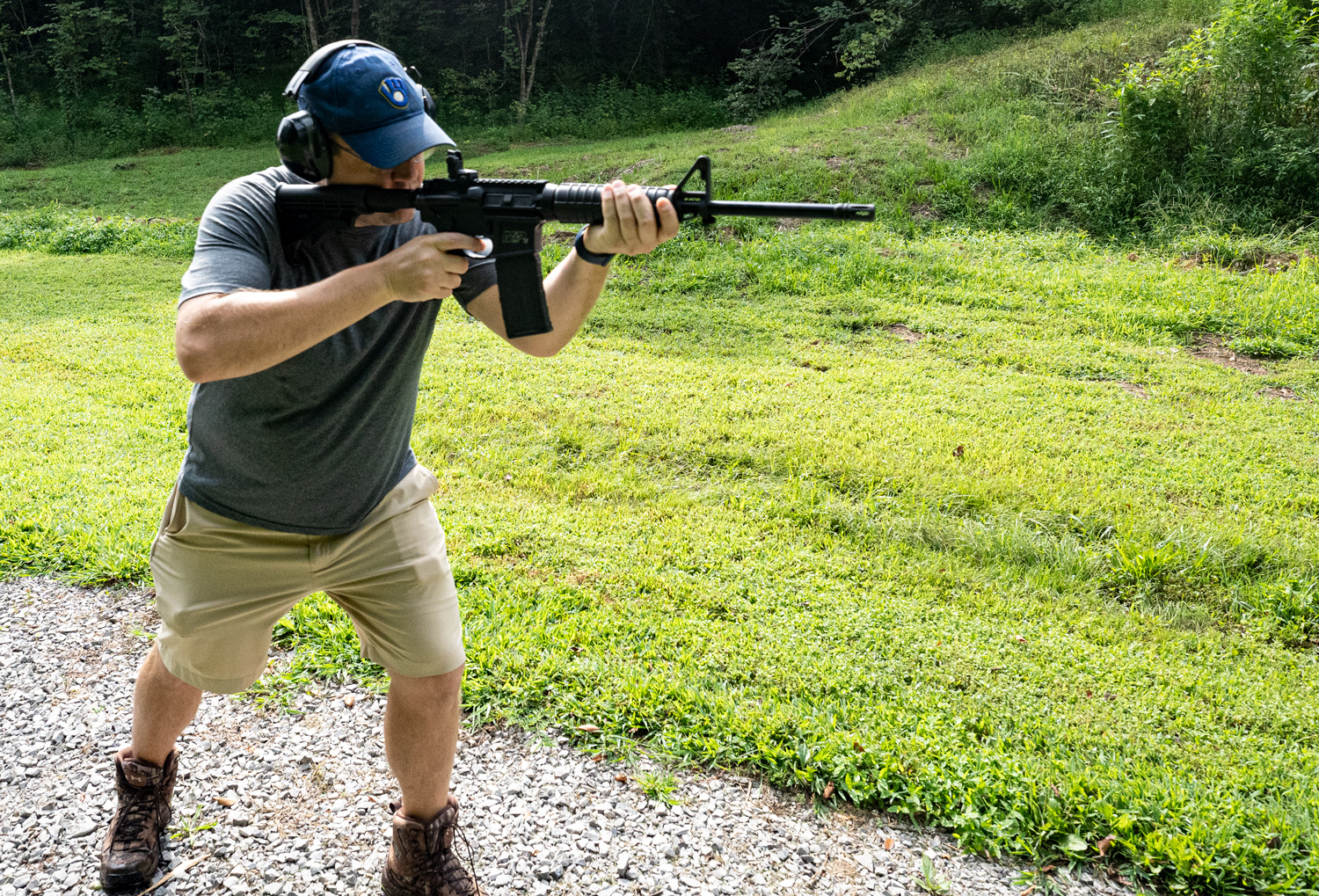 Shooting an AR-15 with a 30 round magazine at a rifle range