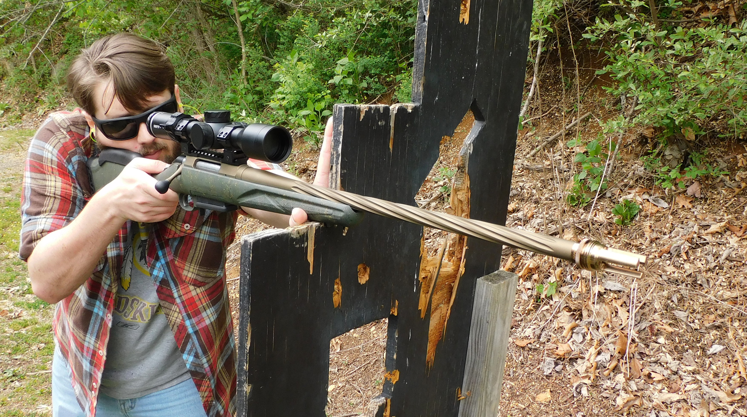 Shooting-Rugar-American-Predator-from-behind-barrier The author firing the Ruger American Gen II Predator rifle from behind a barrier