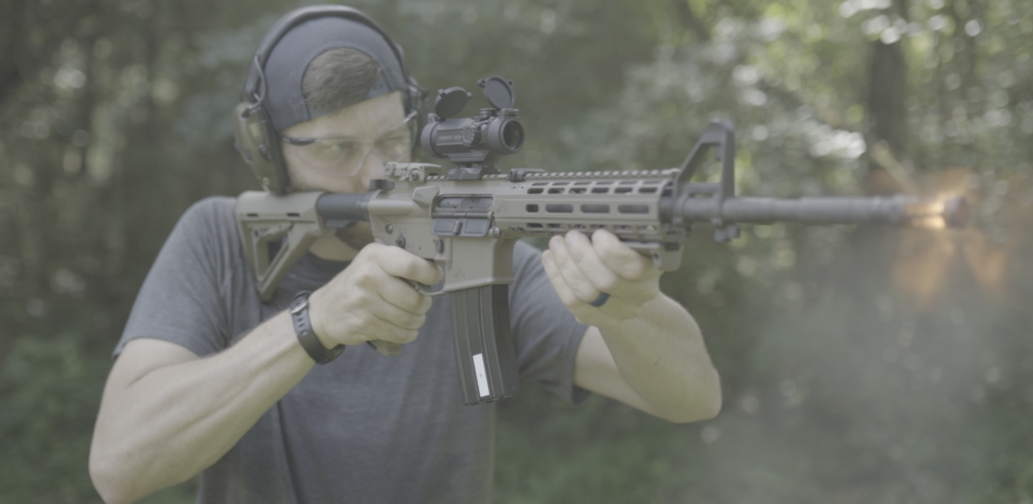 Firing an AR-15 and testing the magazine at a shooting range