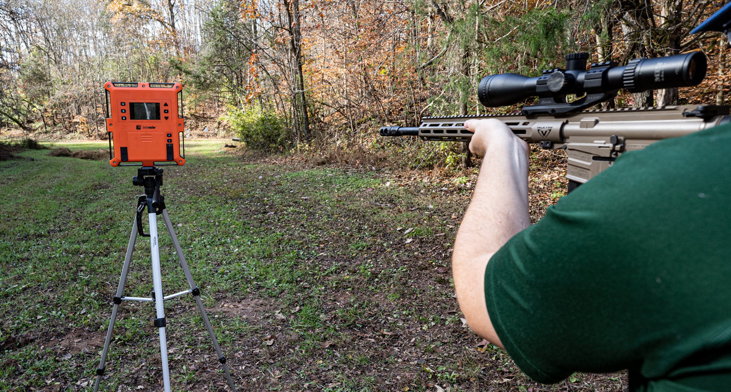 testing muzzle velocity with a chronograph at a shooting range