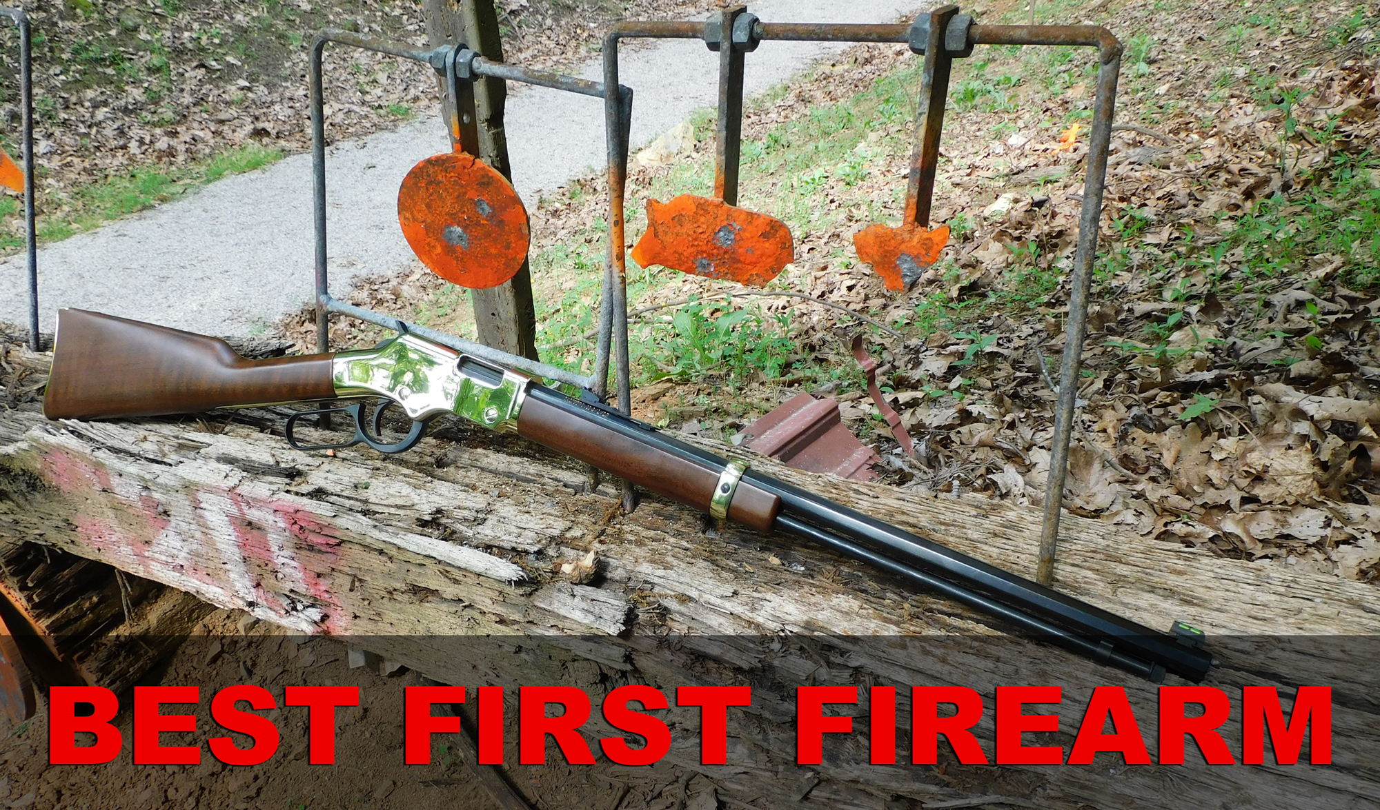 A Henry lever action rimfire rifle, a great first firearm, on display at a shooting range