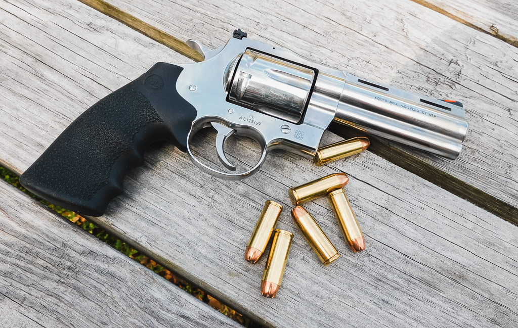 Colt Anaconda exposed on a table with .45 colt ammo