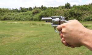 Firing the Colt Viper revolver at the shooting range to get muzzle velocity data and test accuracy.