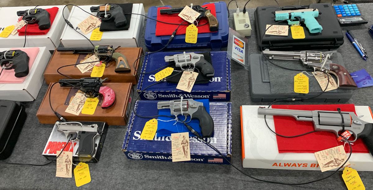 guns for sale at a gun show