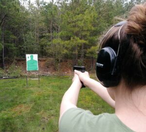 Woman shooting a handgun