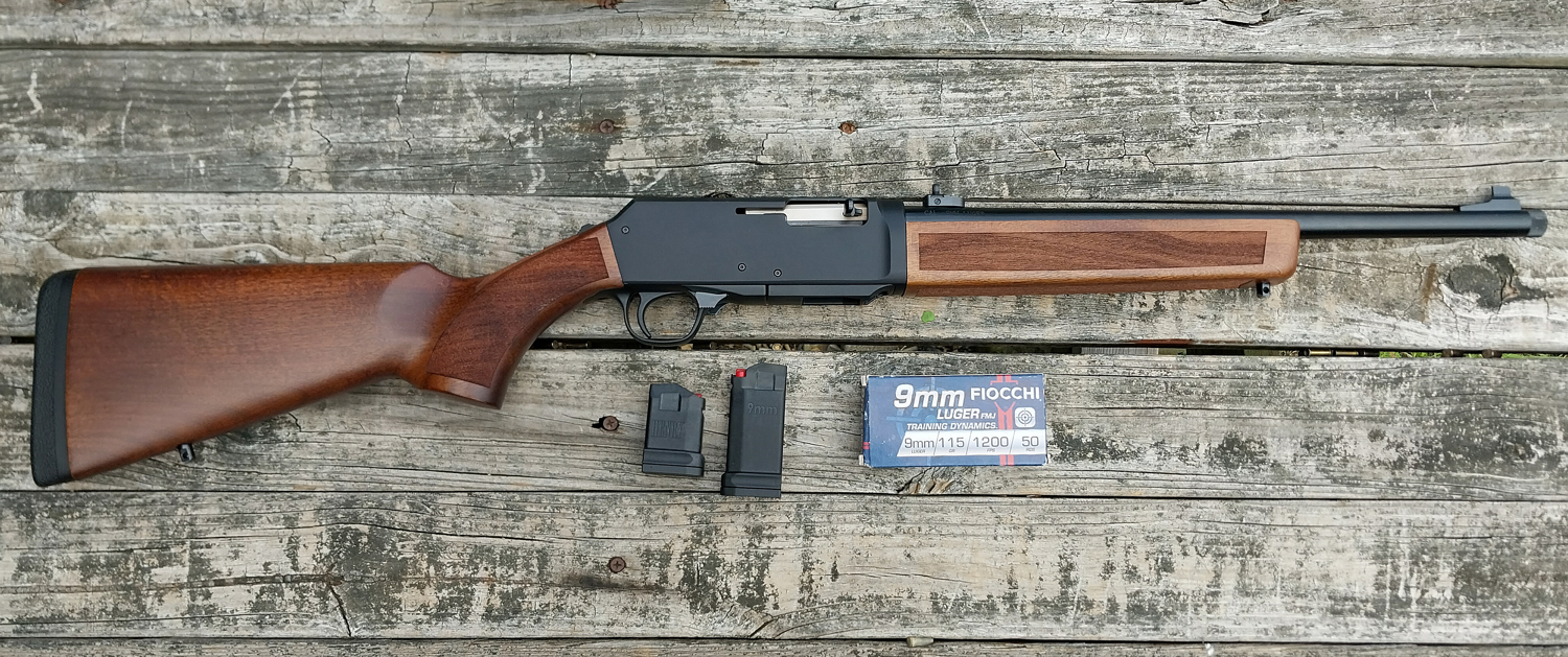 The Henry Homesteader carbine on display with magazines and ammo