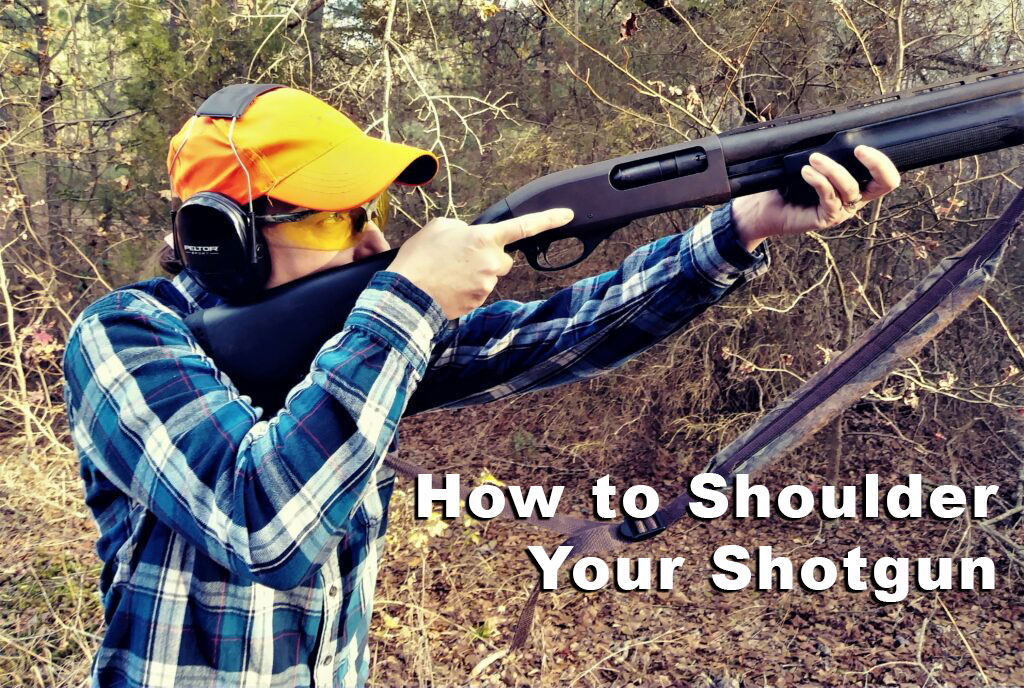 Demonstrating the correct way to shoulder a shotgun