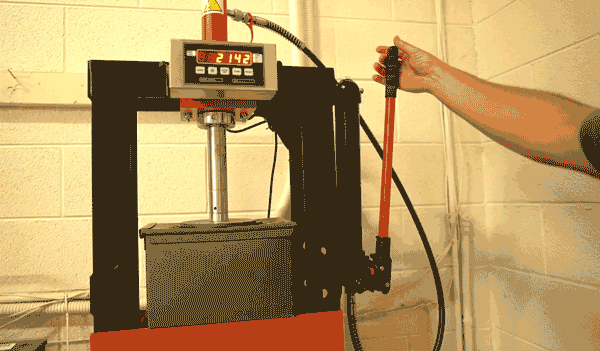 an m2a1 can giving way after being tested with a hydraulic press
