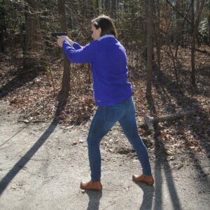 The author demonstrating the weaver stance at a shooting range